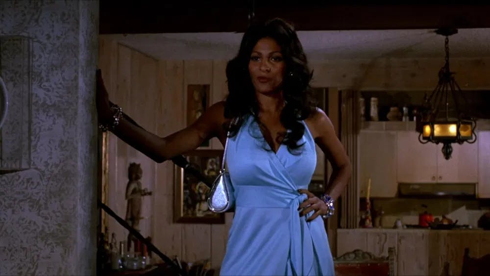 Oogling the stars: Foxy (Pam Grier) goes undercover as a prostitute as part of her plan to get revenge in "Foxy Brown" / Photo courtesy of American International Pictures.