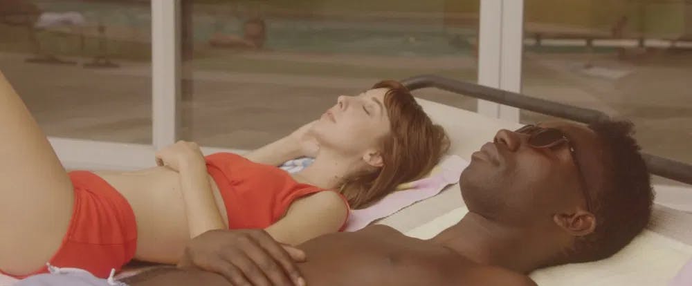 Hot romantic setup: Wendy McColm and Nathan Stewart-Jarret take in the sun in "Pink Grapefruit" / Photo courtesy of Divide Conquer.