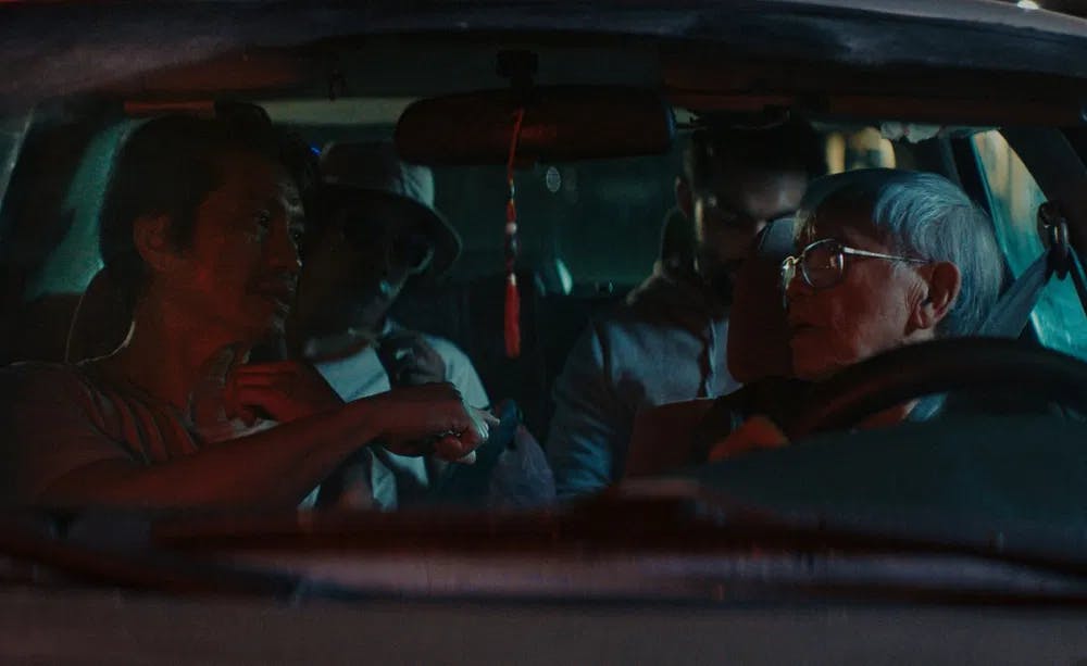 Drive, he said: Nguyen, Nghia, Vu and Benssalah go fast nowhere in The Accidental Getaway Driver / Photo by Ron Batzdorff, courtesy of The Sundance Institute