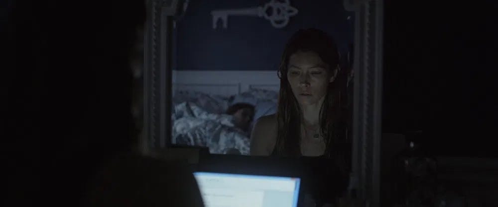 Dear diary: Jessica Biel writes down deep thoughts in the dead of night in "Bleeding Heart" / Photo courtesy of Gravitas Ventures.