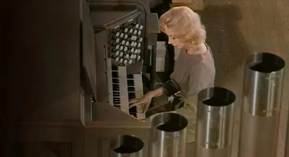 The Haunting of Mary Henry: Candace Hilligoss plays the organ in "Carnival of Souls." / Photo courtesy of Harcourt Productions.