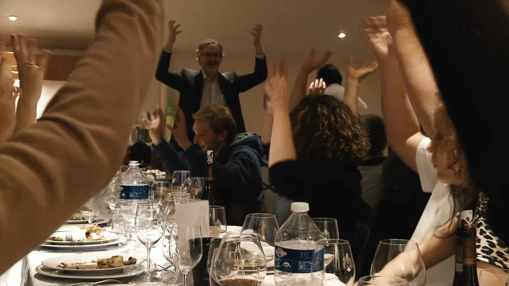 Ponsot and his workers celebrate the end of the harvest in "Sour Grapes" / Photo courtesy of Gravitas Ventures.
