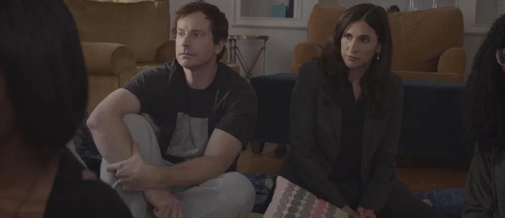 Together, we are heavy: George Huebel and Michaela Watkins are the bane of New Age gurus everywhere in "Cuddle Party."