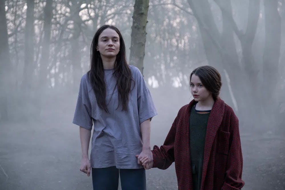 Sisters in terror: Ella (Aisling Franciosi) gets unexpected inspiration from the little girl next door (Caoilinn Springall) in "Stopmotion." / Courtesy of Samuel Dole. An IFC Films and Shudder release.