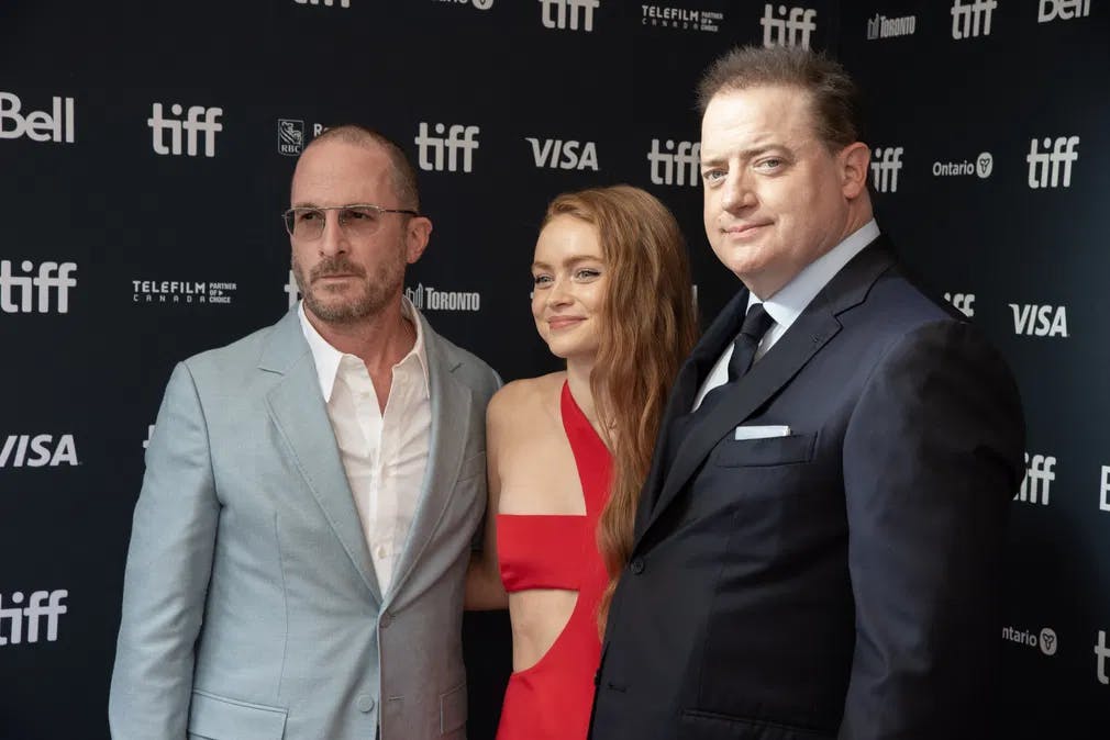 "The Whale" Riders: Director Darren Aronofsky stars Sadie Sink and Brendan Fraser at the TIFF premiere of the film.