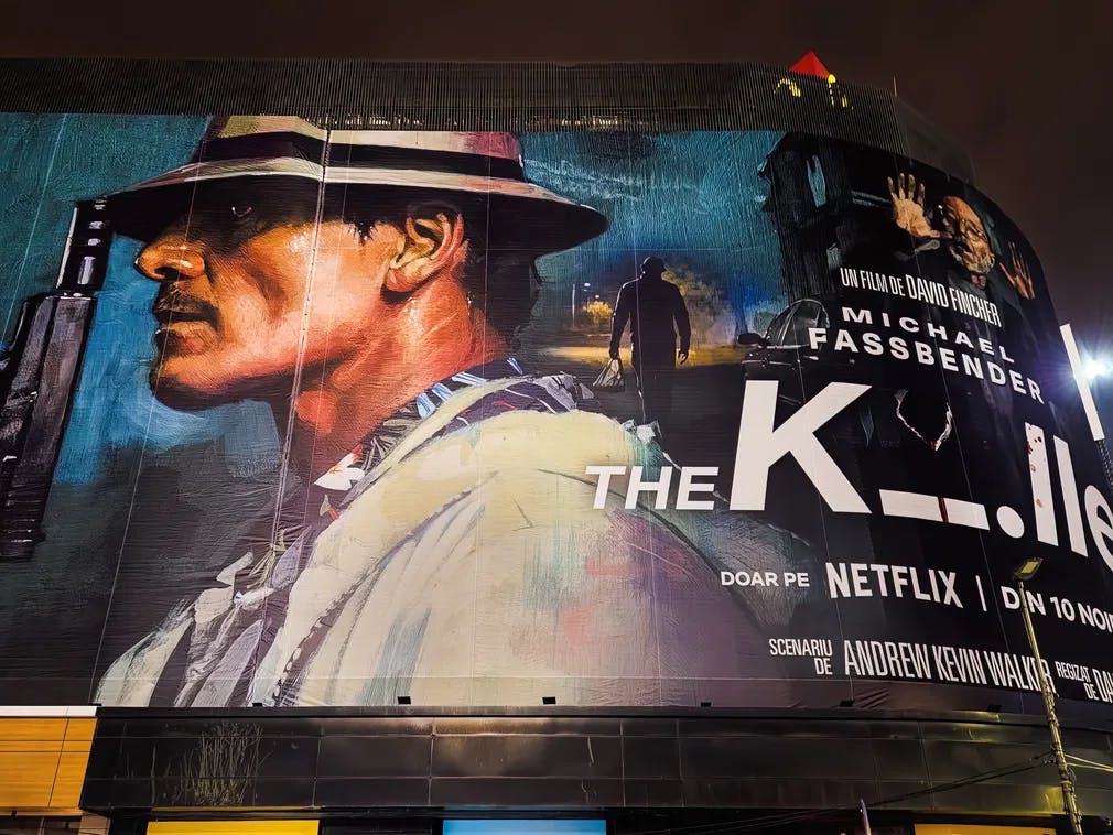 It's big in Romania: a giant sign promoting "The Killer" in Bucarest. / Photo courtesy of Dreamstime.