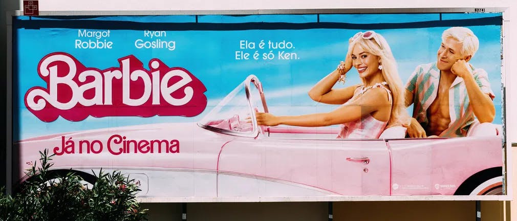 How do you say "He's Just Ken" in Portuguese? : a roadside sign of "Barbie" in Lisbon, Portugal. / Photo courtesy of Dreamstime.